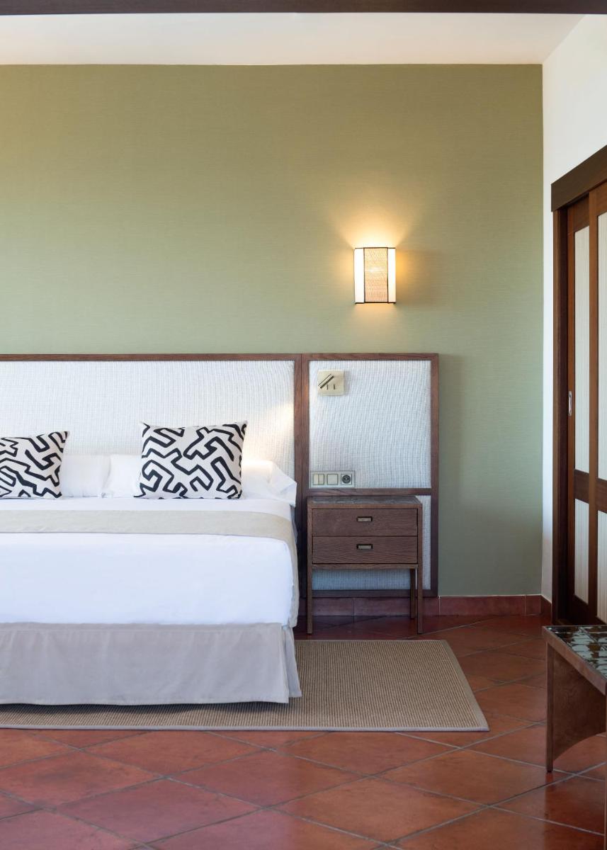 Cama o camas de una habitación en Puerto Antilla Grand Hotel