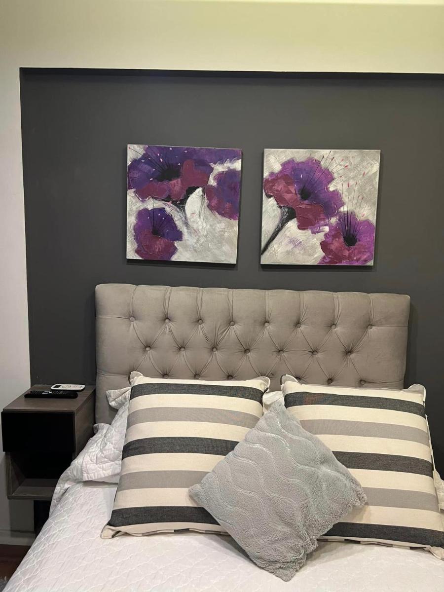 Suite in San Telmo dormitorio en suite con dos baños y balcon a la calle - Housity