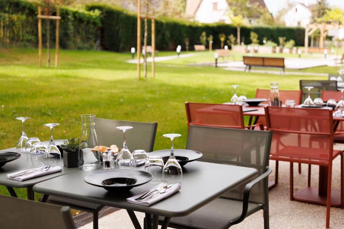 Jardin de l'établissement Les Boréales - Appart'hotel & Restaurant