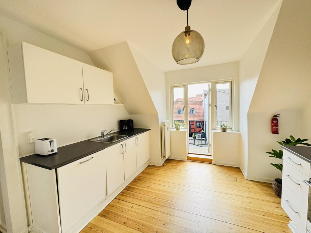 aday - 1 bedroom balcony apartment on the pedestrian street in Randers - Housity