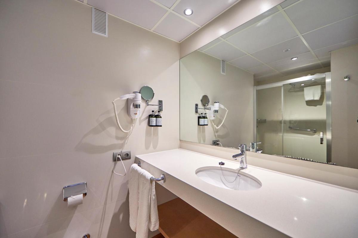 Un baño de Aparthotel Ponent Mar
