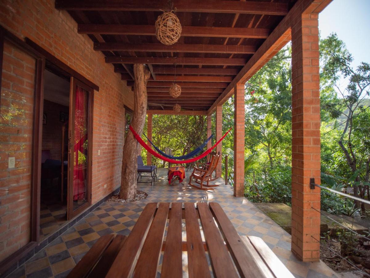 2 bedroom apartment in lush garden, 3 blocks from beach and center of San Juan - Housity