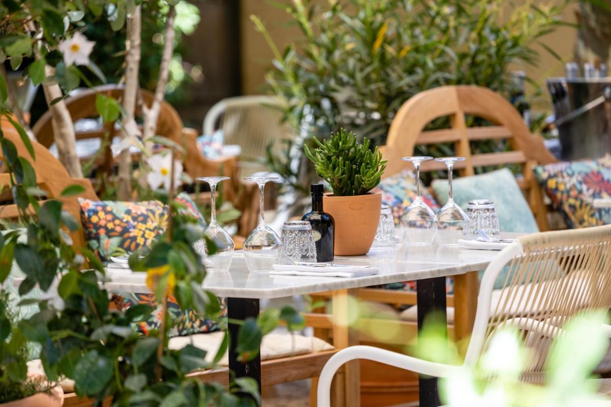 Jardin de l'établissement Hôtel - Restaurant & Spa La Magdeleine - Mathias Dandine