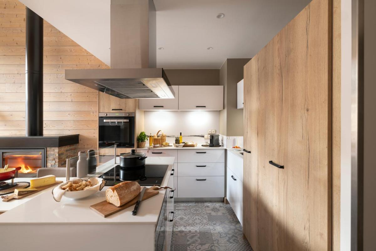 Cuisine ou kitchenette dans l'établissement Résidence Pierre & Vacances Premium L'Hévana