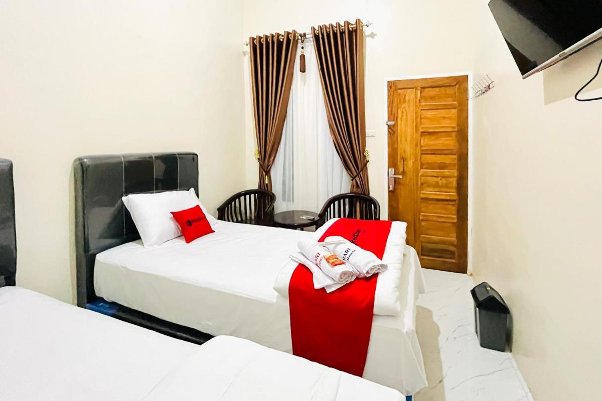RedDoorz @ Gunari Guest House Merek Karo - Housity