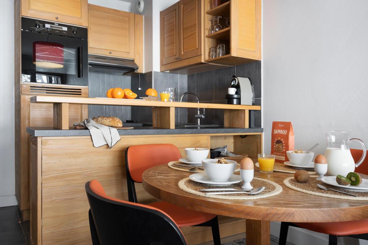 Cuisine ou kitchenette dans l'établissement Résidence Pierre & Vacances Premium Les Terrasses d'Eos