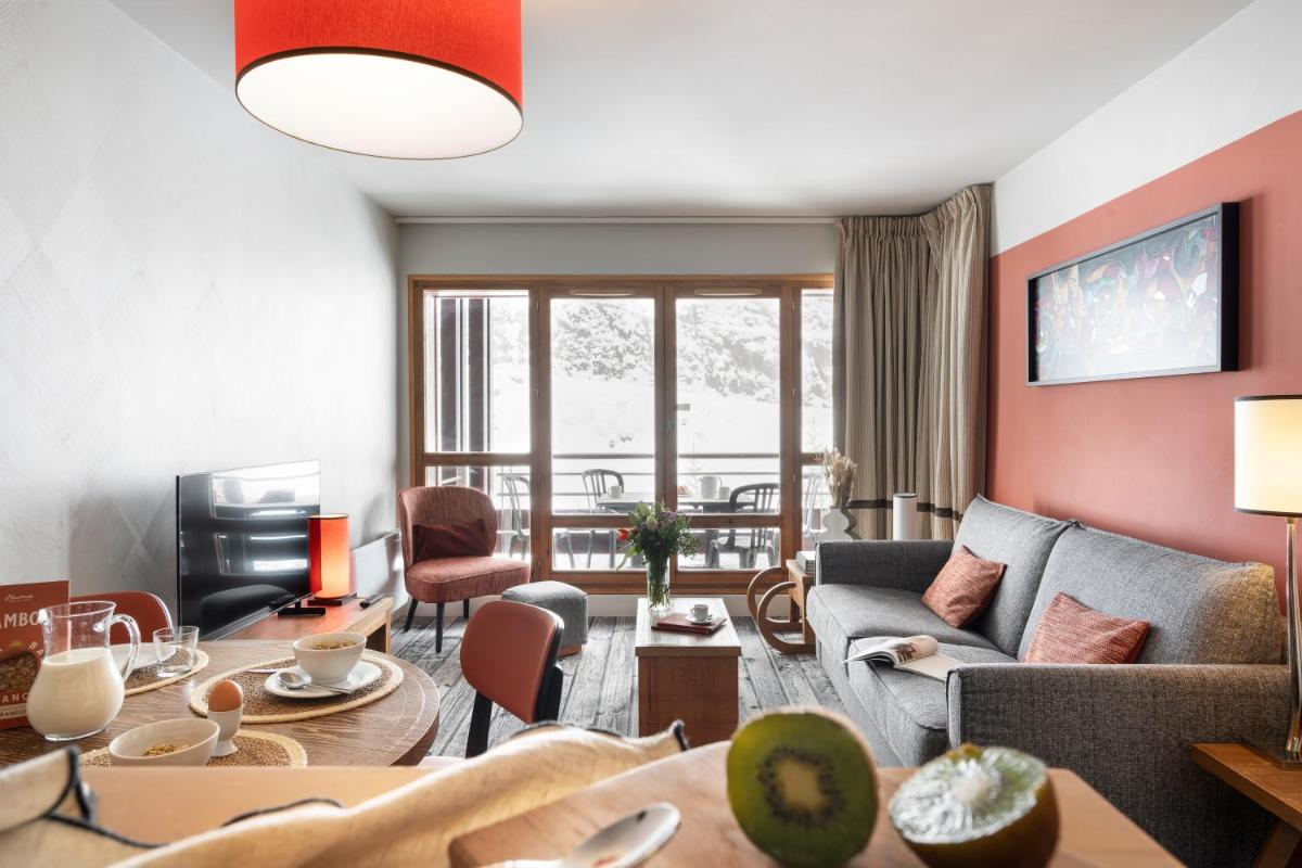 Coin salon dans l'établissement Résidence Pierre & Vacances Premium Les Terrasses d'Eos