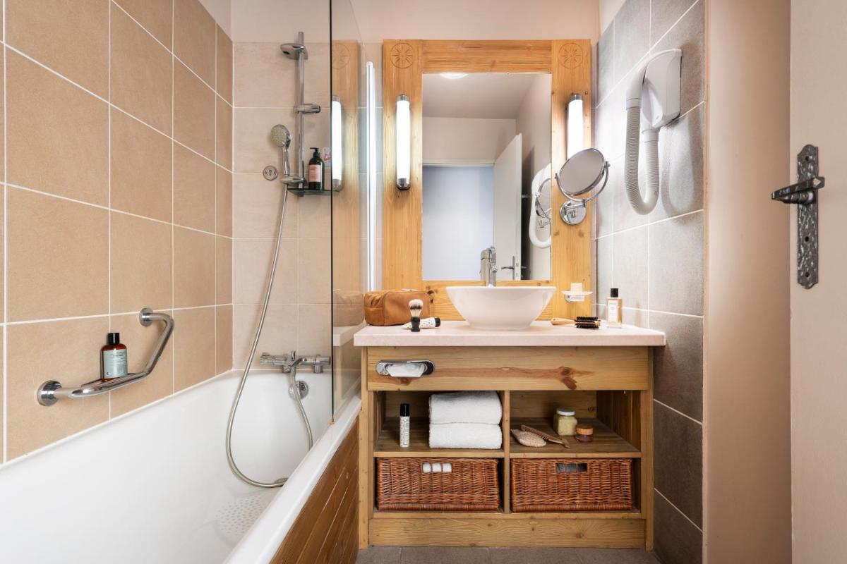 Salle de bains dans l'établissement Résidence Pierre & Vacances Premium Les Terrasses d'Eos