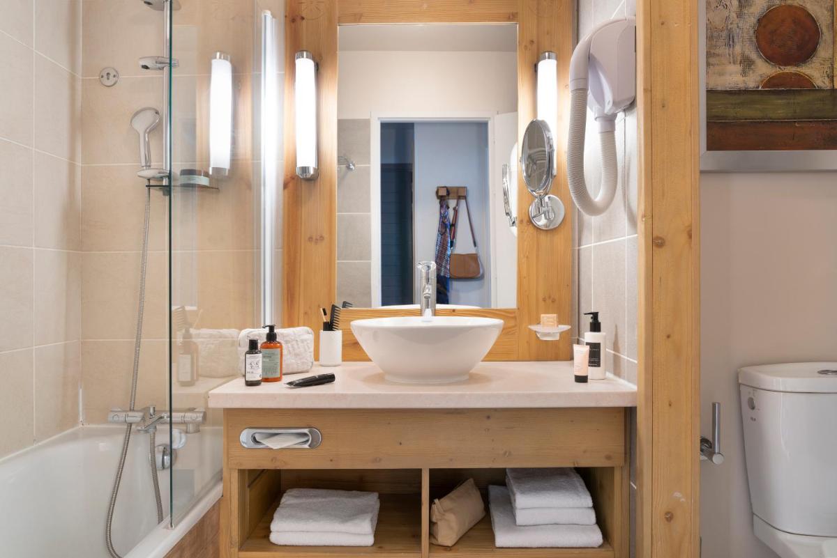 Salle de bains dans l'établissement Résidence Pierre & Vacances Premium Les Terrasses d'Eos