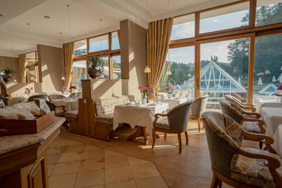 Ein Sitzbereich in der Unterkunft Hotel Deimann
