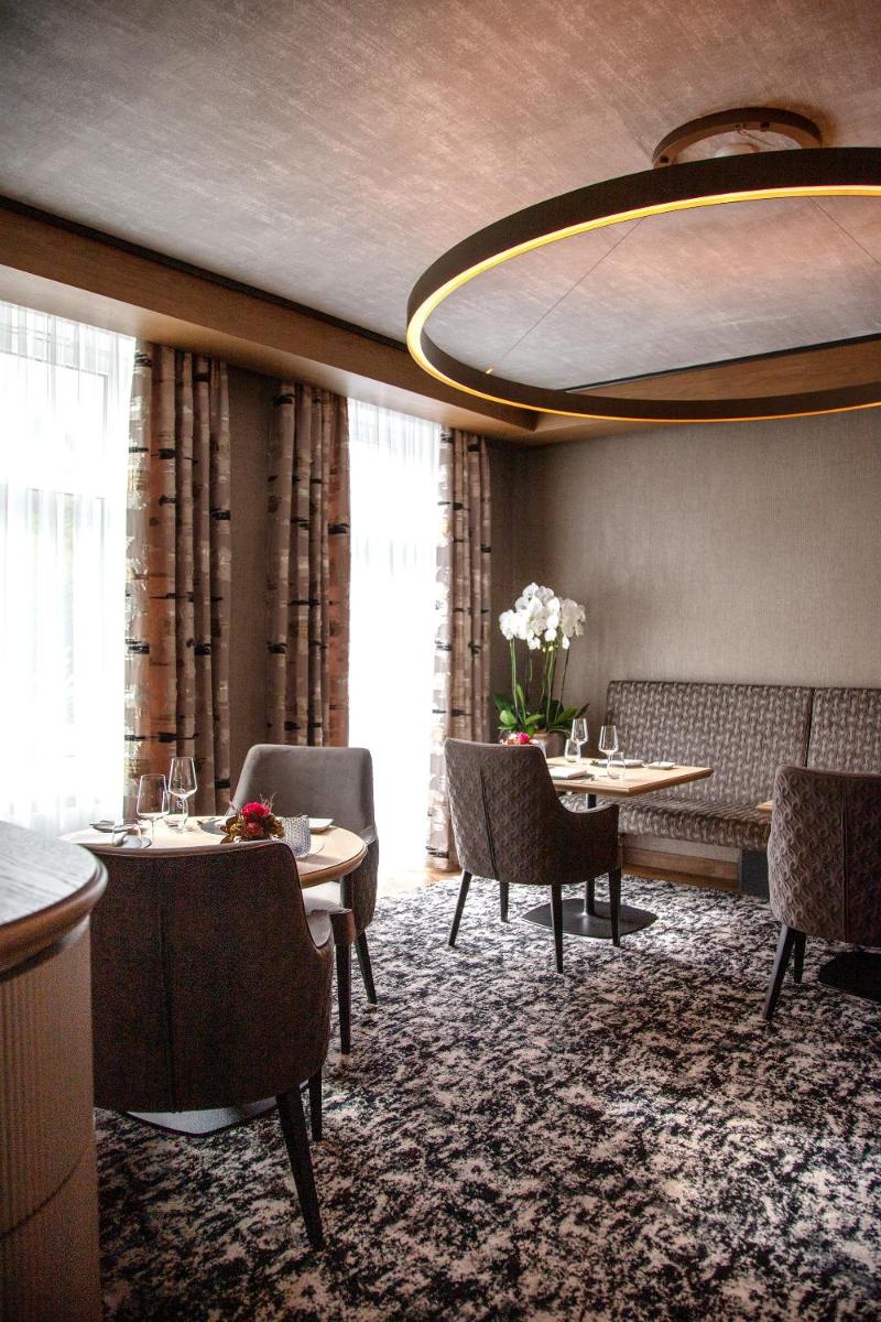 Ein Sitzbereich in der Unterkunft Hotel Deimann
