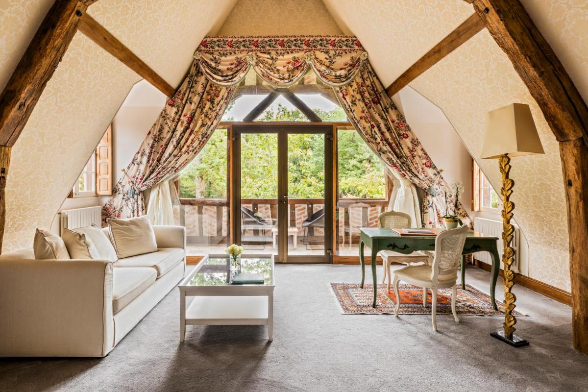 Coin salon dans l'établissement Les Hauts de Loire Relais & Châteaux