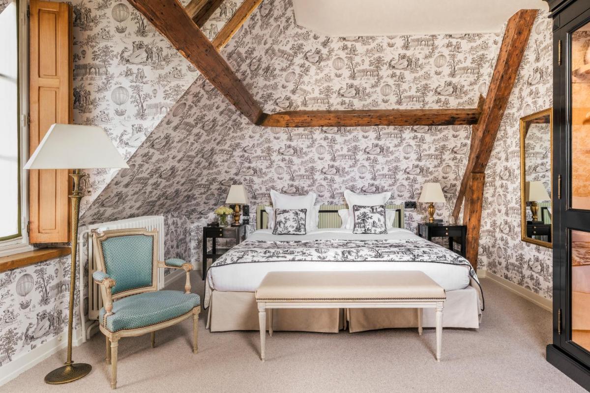Un ou plusieurs lits dans un hébergement de l'établissement Les Hauts de Loire Relais & Châteaux