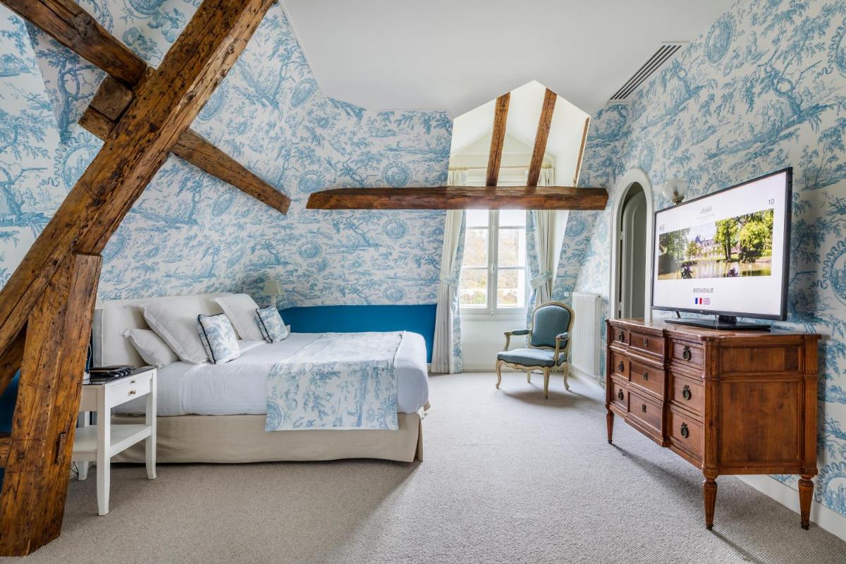 Un ou plusieurs lits dans un hébergement de l'établissement Les Hauts de Loire Relais & Châteaux