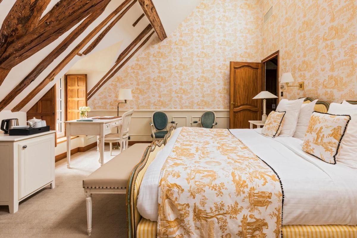 Un ou plusieurs lits dans un hébergement de l'établissement Les Hauts de Loire Relais & Châteaux