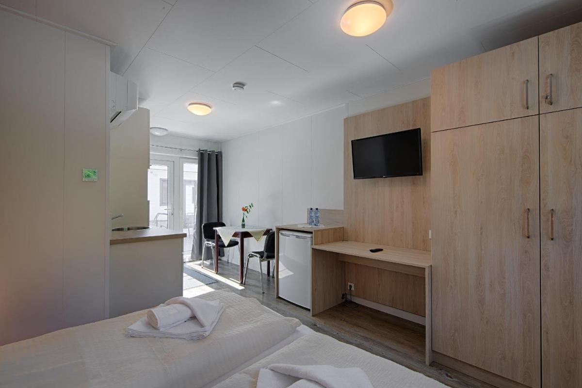 See Hotel Karlslust Chalets - Housity