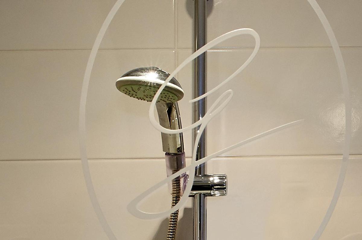 Salle de bains dans l'établissement Hotel Spa et Restaurant Au Chasseur