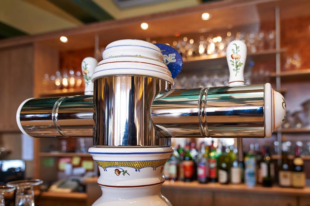 Salon ou bar de l'établissement Hotel Spa et Restaurant Au Chasseur