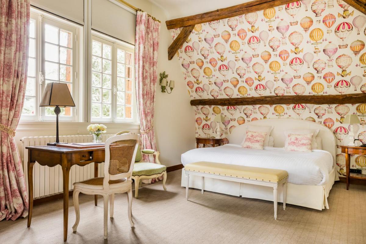 Un ou plusieurs lits dans un hébergement de l'établissement Les Hauts de Loire Relais & Châteaux