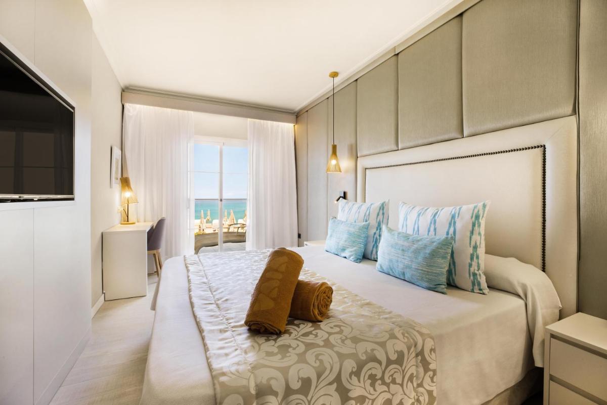 Cama o camas de una habitación en VIVA Cala Mesquida Resort & Spa