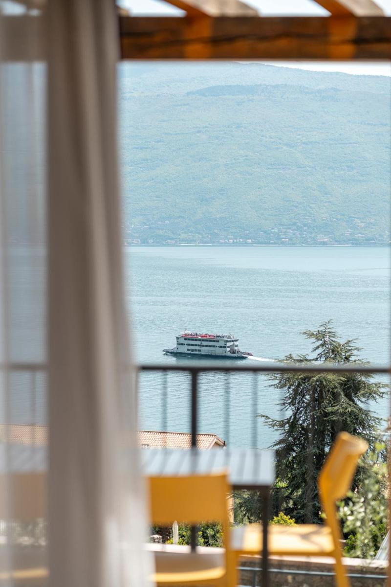 Residence Dany appartamenti con cucina vista lago piscina e parcheggio - Hizvo