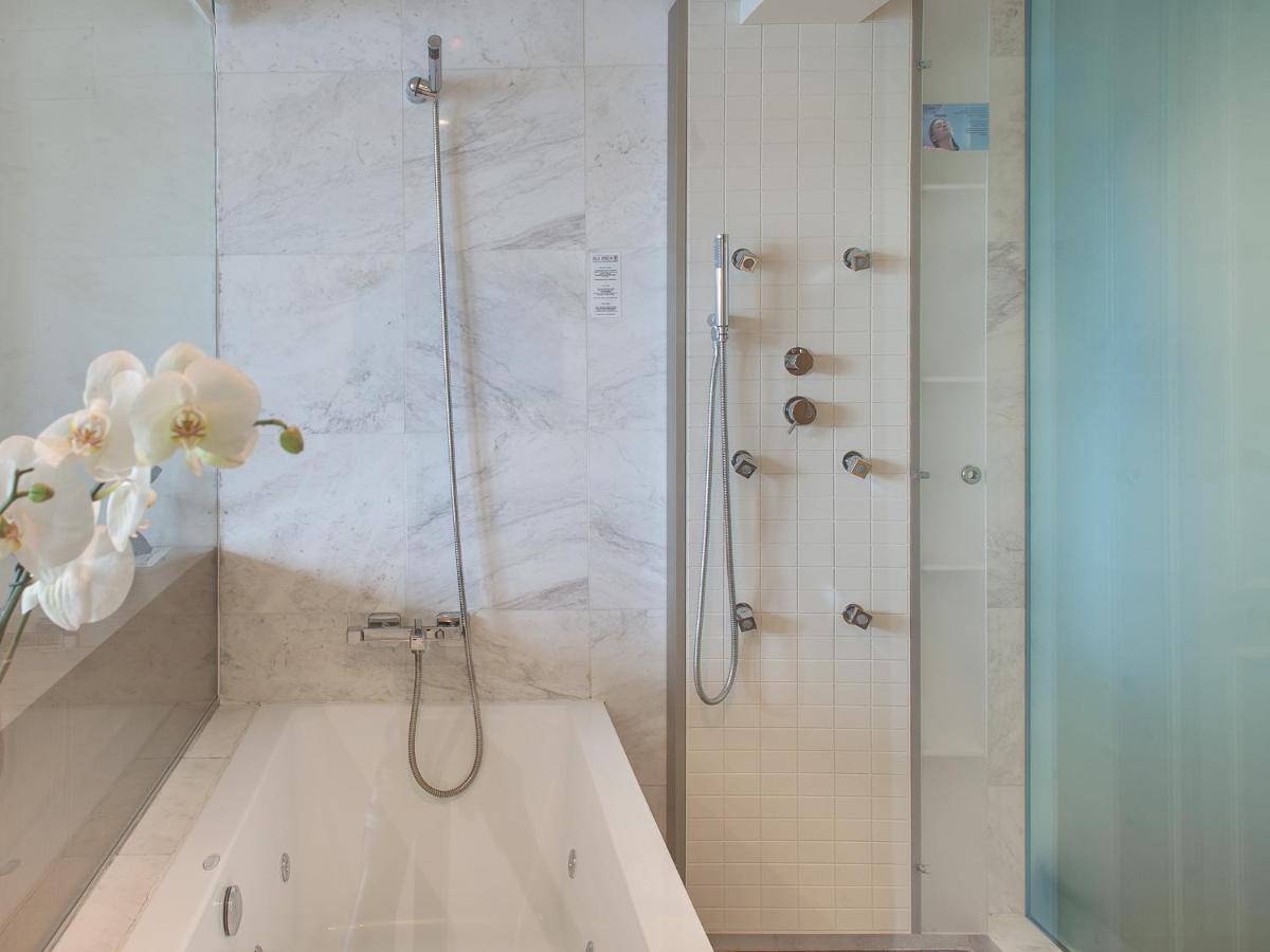 Un baño de Hotel Boutique Villa Venecia