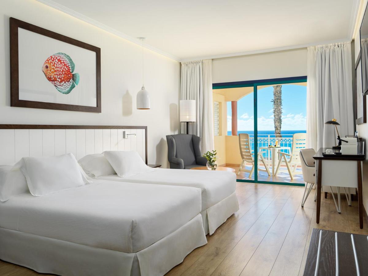 Cama o camas de una habitación en H10 Playa Esmeralda - Adults Only