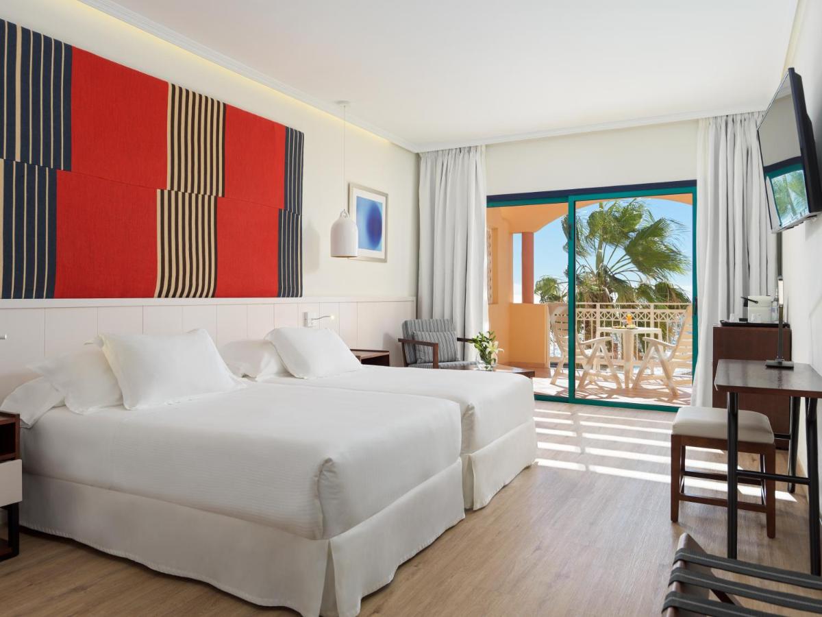 Cama o camas de una habitación en H10 Playa Esmeralda - Adults Only