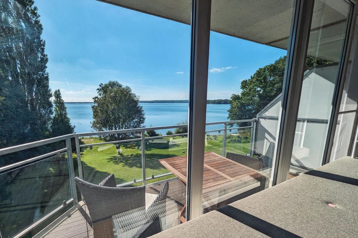 Junior-Suite am See - Housity