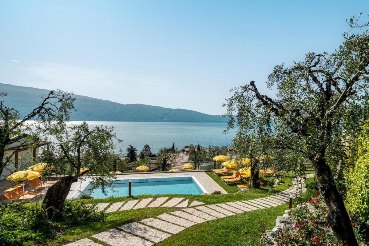 Residence Dany appartamenti con cucina vista lago piscina e parcheggio - Hizvo