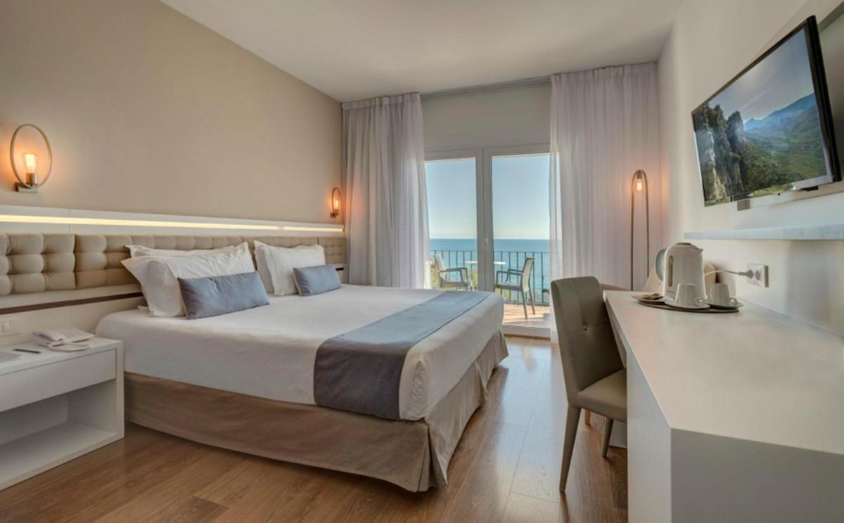 Cama o camas de una habitación en Park Hotel San Jorge & Spa by Escampa Hotels