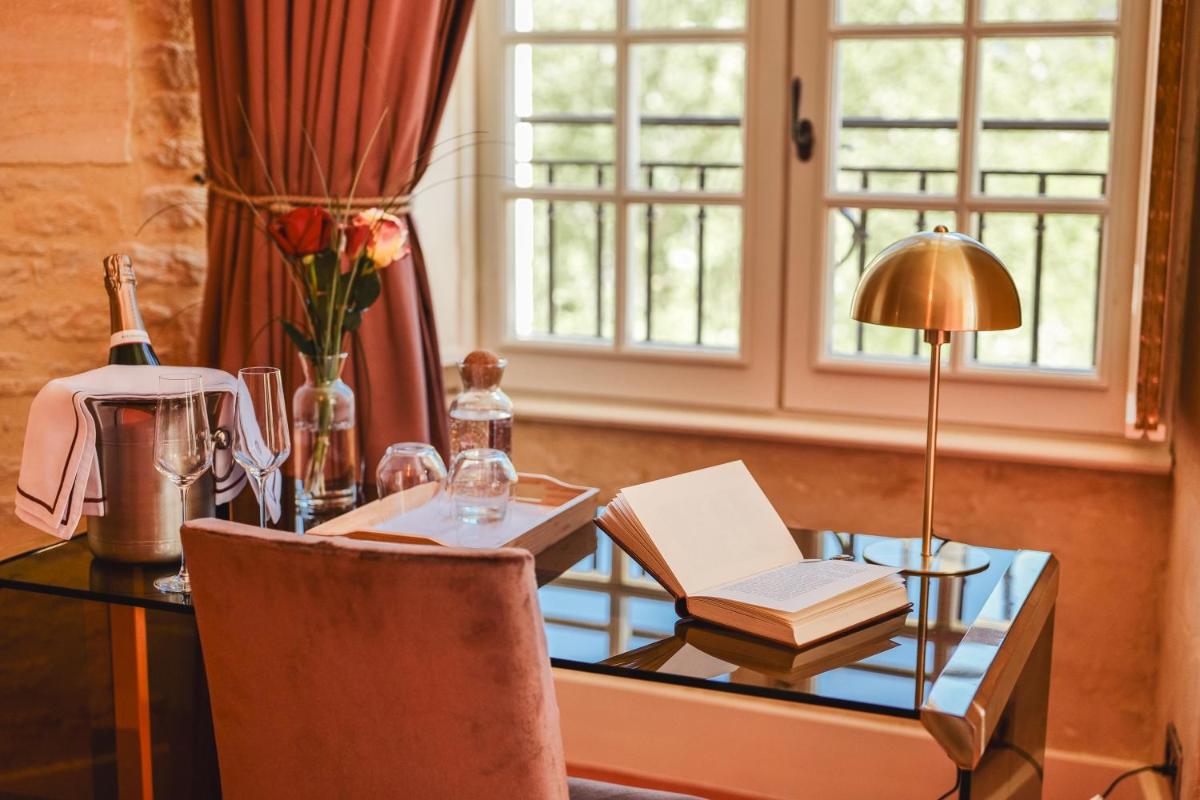 Coin salon dans l'établissement Domaine de Coeurmandie - Hôtel Château