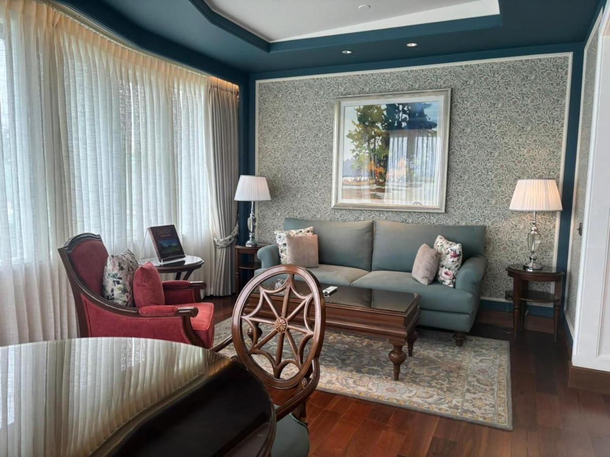 a living room with a couch and two chairs at Welcomhotel by ITC Hotels, The Savoy, Mussoorie in Mussoorie