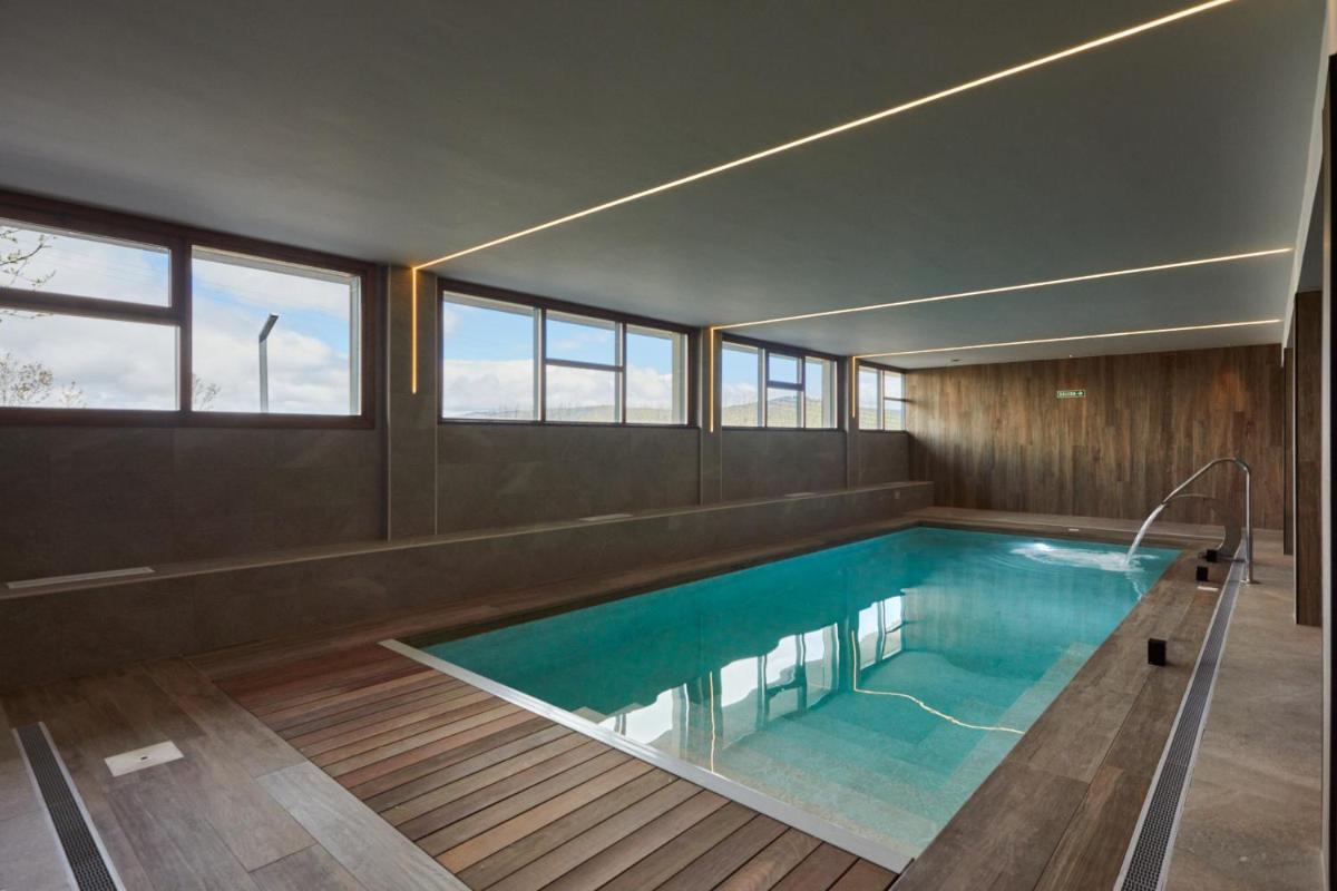 Piscina en o cerca de Apartamentos Silken Fontibre Iberia & Spa