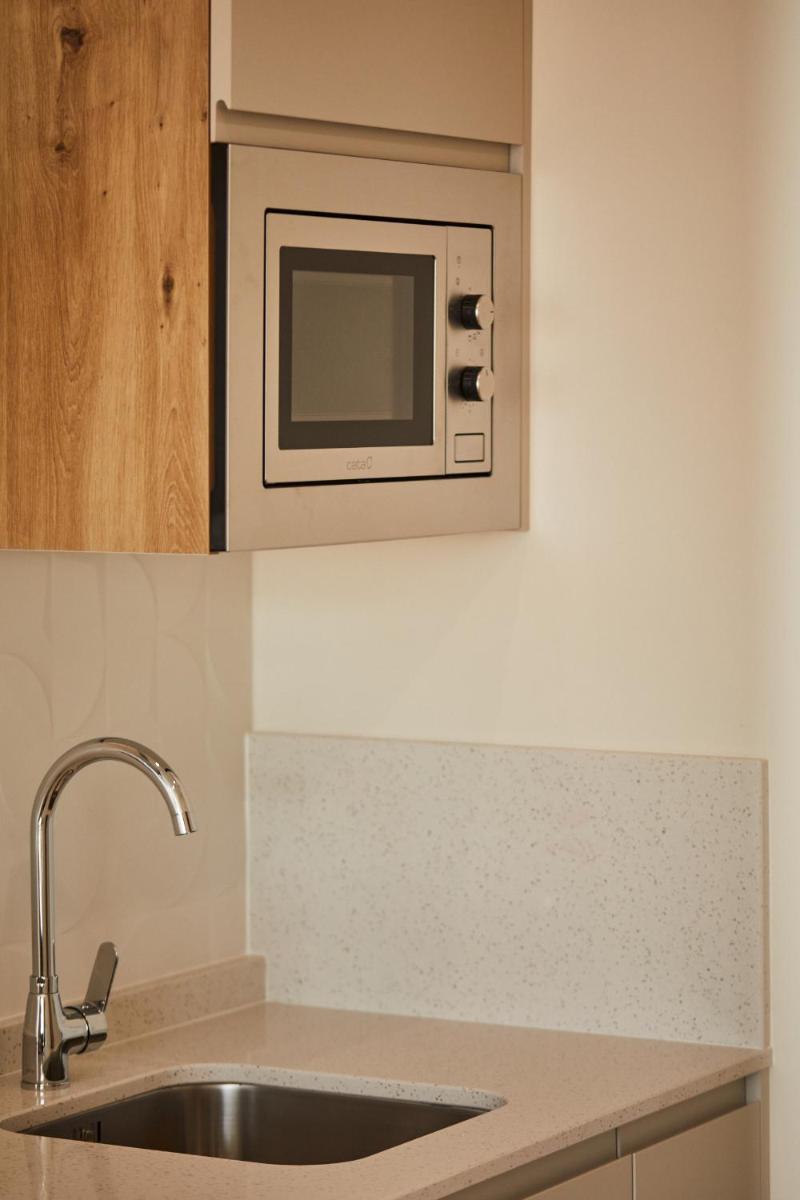 Una cocina o zona de cocina en Apartamentos Silken Fontibre Iberia & Spa