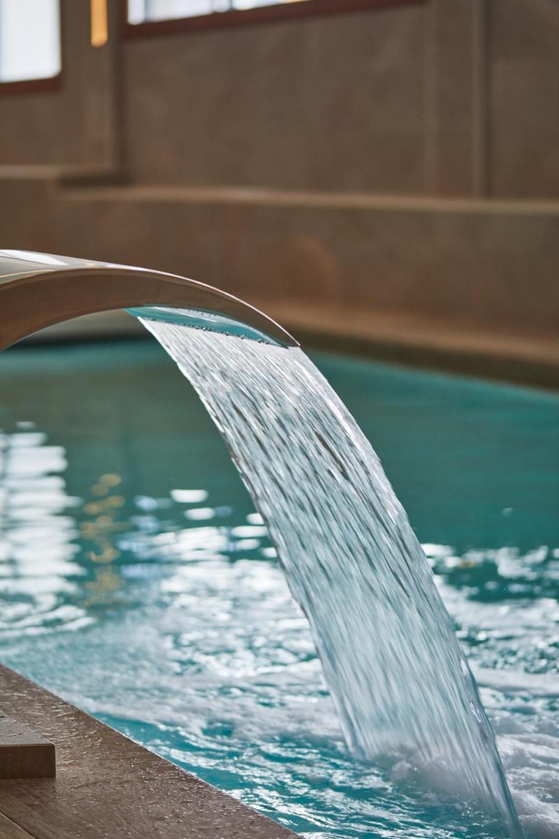 Piscina en o cerca de Apartamentos Silken Fontibre Iberia & Spa