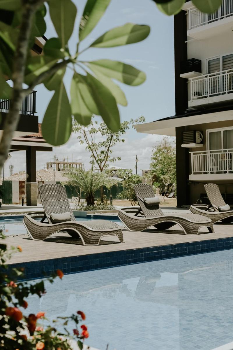 Amani Grand #332, Near Mactan Airport,Fast WIFI, Netflix & Pool - Housity