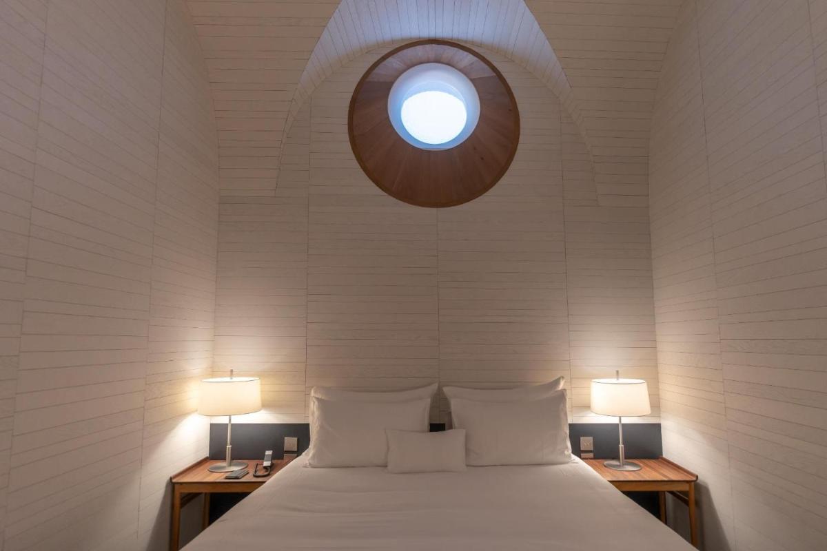 Cama o camas de una habitación en Atrio