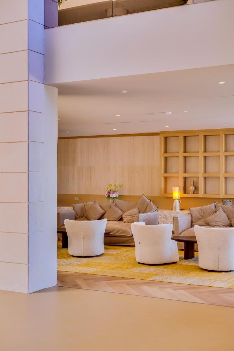 Uma área de estar em Falésia Hotel - Adults Only