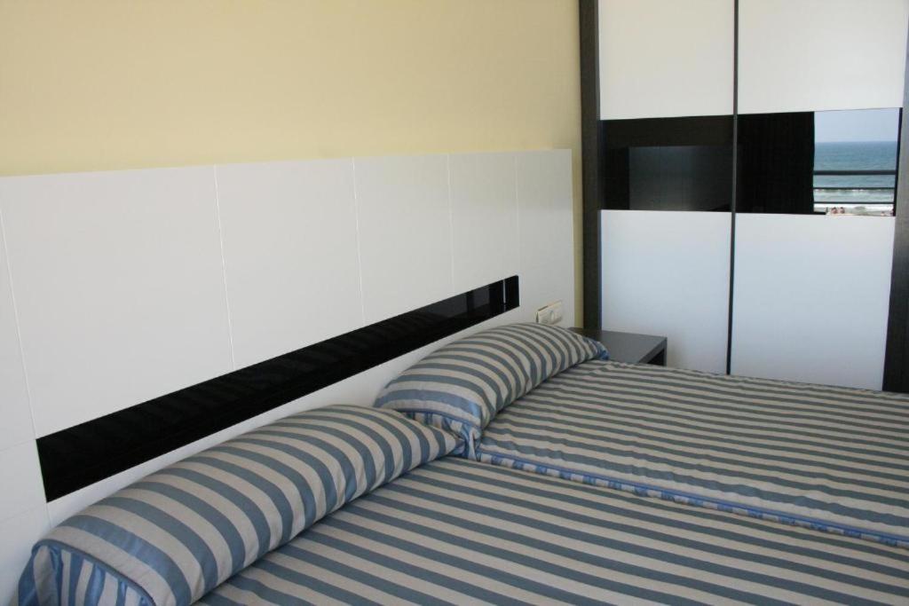 Cama o camas de una habitación en Hotel Playamar Spa