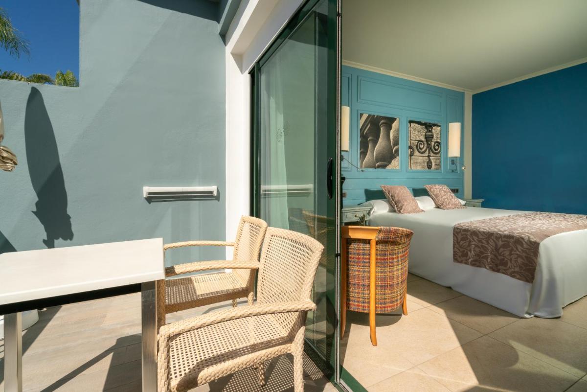 Cama o camas de una habitación en Adrián Hoteles Colón Guanahaní Adultos Only