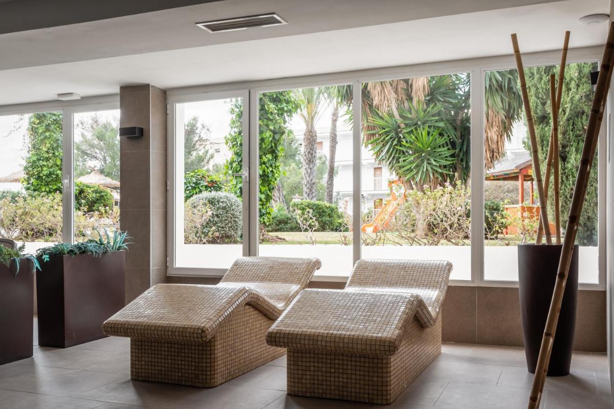 Zona de estar de Apartamentos Vistasol
