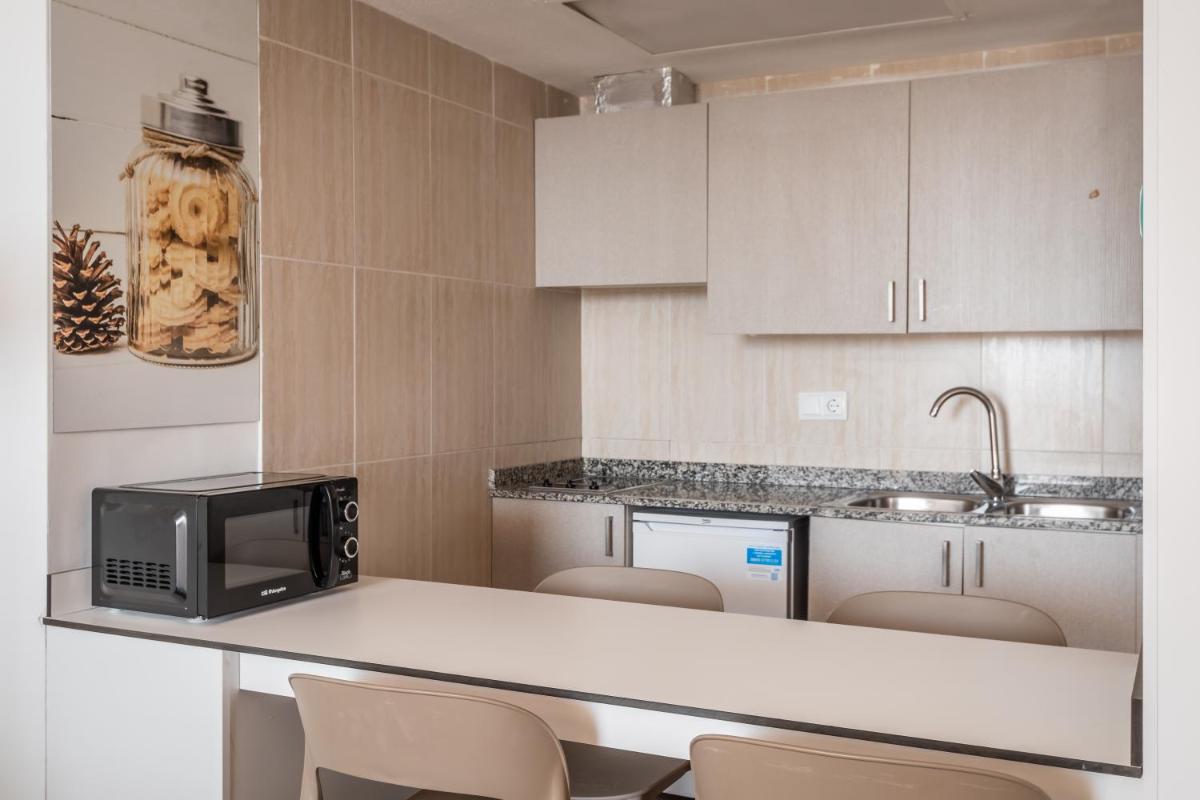 Una cocina o zona de cocina en Apartamentos Vistasol