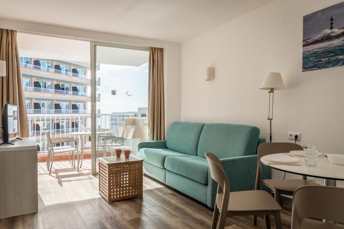Zona de estar de Apartamentos Vistasol