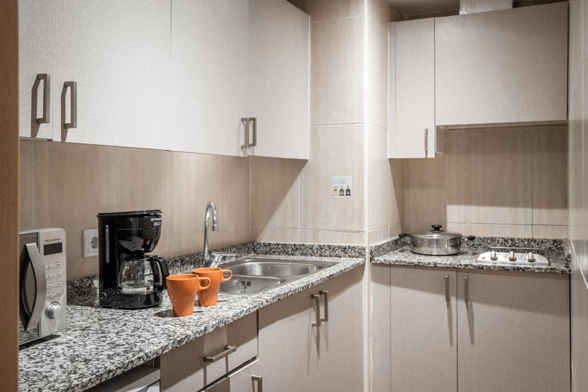 Una cocina o zona de cocina en Apartamentos Vistasol