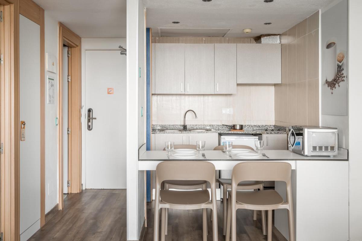Una cocina o zona de cocina en Apartamentos Vistasol