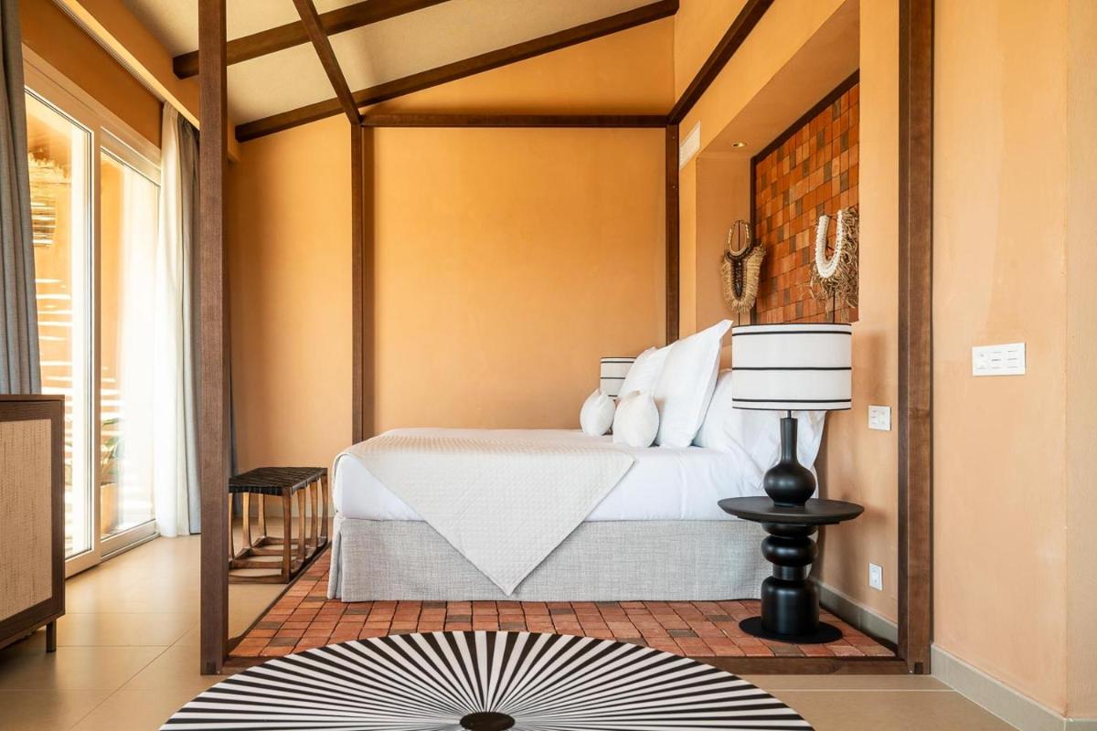 Cama o camas de una habitación en Hotel Ritual de Terra & SPA Moraira