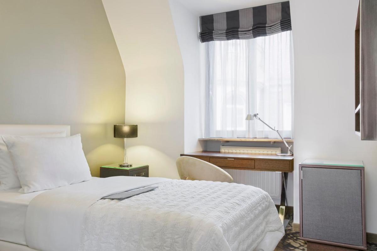 Ein Bett oder Betten in einem Zimmer der Unterkunft Le Méridien Grand Hotel Nürnberg Ein Bett oder Betten in einem Zimmer der Unterkunft Le Méridien Grand Hotel Nürnberg