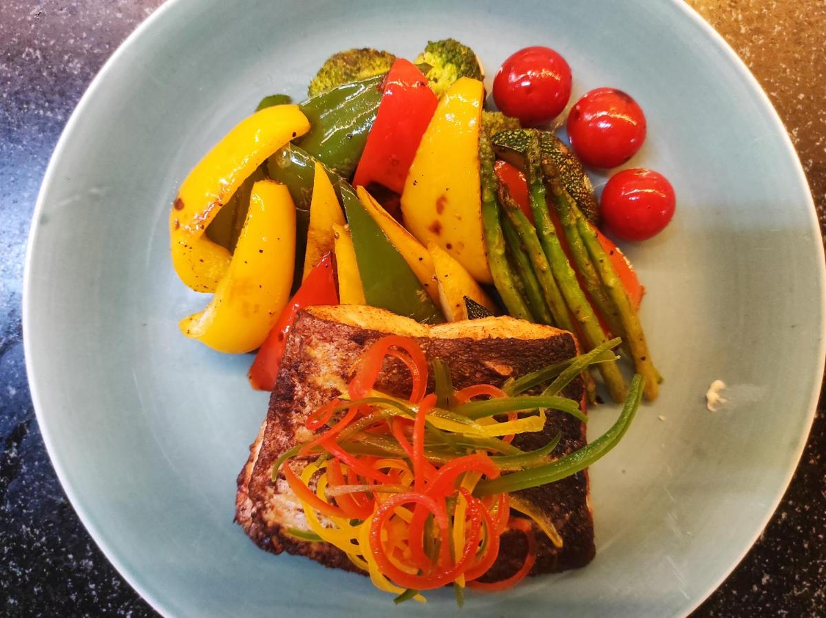 a plate of food with meat and vegetables on it at Novotel Kolkata Hotel and Residences in Kolkata a plate of food with meat and vegetables on it at Novotel Kolkata Hotel and Residences in Kolkata