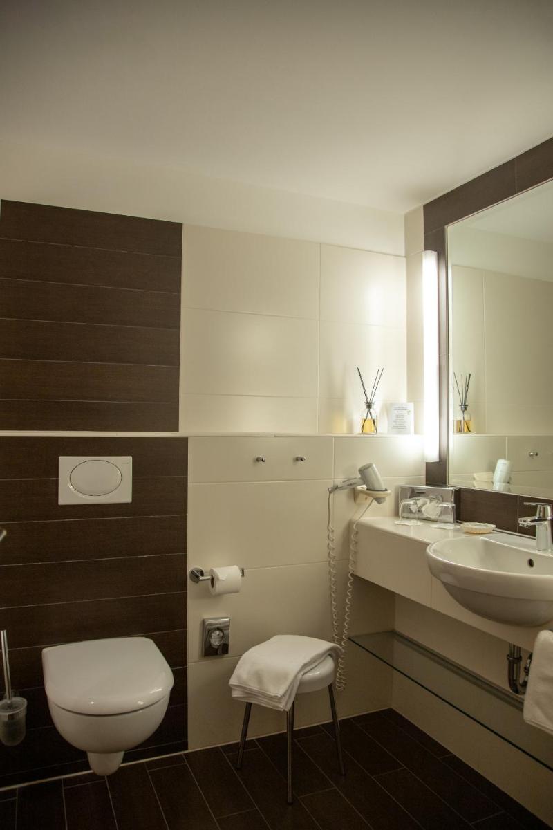 Ein Badezimmer in der Unterkunft Hotel Deimann